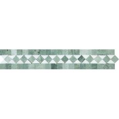 a green and white tiled wall with an arrow pattern on it's side,