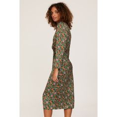 Green floral (100% Polyester). Hourglass. Long sleeves. Mock neck. side zipper closure. 44.5" from shoulder to hemline. Imported. Floral Print Long Sleeve Dress For Fall Garden Party, Fall Floral Print Long Sleeve Dress For Garden Party, Fitted Ditsy Floral Dress For Fall, Fitted Floral Print Dress For Fall, Long Sleeve Floral Midi Dress For Garden Party, Long Sleeve Midi Dress For Fall Garden Party, Fall Long Sleeve Midi Dress For Garden Party, Long Sleeve Midi Dress For Garden Party In Fall, Long Sleeve Floral Dress For Garden Party In Fall