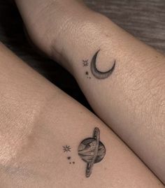 two people with tattoos on their legs, one is holding the other's arm