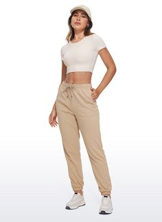 Features high-end fabrics that are soft, breathable and stretchy, designed for luxurious comfort. Double-layer fabric for not see-through and supportive fit. You can wear it even without a bra. Tight fit, cropped length: Sit at the waist, and contour your flattering body curves. Feature & Fitting: 
 Butterluxe collection 
 Design for yoga 
 Cropped length, Tight fit 
 Double lined and Round neck design 
 Fabric: 
 Extremely Soft, luxurious comfort and lightweight 
 Ultra stretchy, gently com Fitted Seamless Cropped Bottoms, Casual Elastane Crop Top For Yoga, Fitted Tops With Elastic Waistband For Loungewear, Beige Fitted Activewear For Spring, High Stretch Cropped Crop Top For Loungewear, Comfortable Fitted Crop Top, Casual Cropped High Stretch Bottoms, Casual High Stretch Cropped Bottoms, Non-stretch Solid Cropped Crop Top