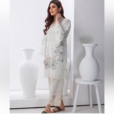 Brand New Beautiful Embroidery And Mirror Work Along With Cutwork Detail. Trouser With Cutwork Detail. Brand: Zainab Material: Lawn Color: Off White Shirt & Trouser Unstitched Cream Dress For Summer, Eid Long Sleeve Dress With Cutwork, White Cutwork Dress For Eid, Long Sleeve Cutwork Dresses For Eid, Long Sleeve Dresses With Cutwork For Eid, White Cutwork Dress For Festive Occasions, Festive White Dress With Cutwork, Festive White Cutwork Dress, Elegant White Kurta For Spring