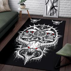 a living room area rug with an image of two skulls on the floor and red eyes