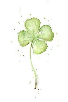 a watercolor painting of a four leaf clover