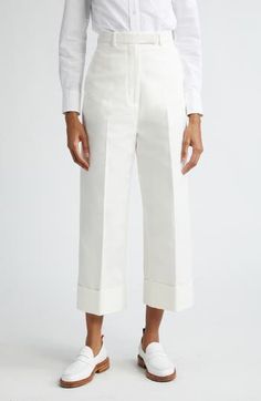 Crisply pressed pleats bring angularity to the straight-cut legs, and wide fold-over cuffs hit just above the ankles in these seasonally spot-on cotton pants. 25" inseam; 22" leg opening; 14" front rise; 20" back rise (size 42IT) Zip fly with hook-and-bar closure Side-seam pockets 100% cotton Dry clean Made in Italy Designer Clothing Classic Pants With Button Cuffs For Spring, Classic Spring Pants With Button Cuffs, Elegant Bottoms With Straight Hem For Spring, Elegant Wide Leg Bottoms With Belted Cuffs, Elegant Wide Leg Pants With Button Cuffs For Work, Elegant Wide Leg Pants With Belted Cuffs, Elegant Fitted Pants With Flared Cuffs, Tailored Pants With Button Cuffs For Spring, Spring Workwear Wide Leg Pants With Straight Hem