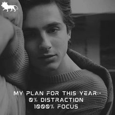 a man in a sweater is holding his hand up to his face and the words, my plan for this year 0 % ditraction focus