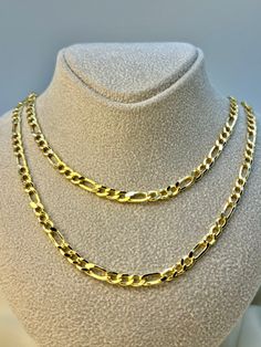 "14k Gold Figaro Necklace ,24\",4mm, 7.41gr 14k Gold Figaro Necklace ,21.5\",4mm, 6.78 gr This is a Trending Etsy Bestselling FIGARO Necklace. It is made with Authentic Genuine Real 14K Gold . Easy to layer! Looks beautiful with your favorite charms or even if you wear it alone. BEST PRICE ON ETSY FOR SOLID 14kGOLD NECKLACES! Premium lobster clasp for added safety! Priced to sell! Compare our prices to other similar sellers! Arrives in a GIFT BOX and includes FREE SHIPPING within the USA and Can Yellow Gold Figaro Chain Necklace, Gold Hallmarked Chain Link Necklace, Anniversary Jewelry With Figaro Chain Link, Anniversary Necklace With Figaro Chain Link, Figaro Link Chain Necklace For Anniversary, Yellow Gold Figaro Chain Necklace As A Gift, Yellow Gold Figaro Chain Necklace For Anniversary, 14k Gold Figaro Chain Necklace For Anniversary, Gold Figaro Chain