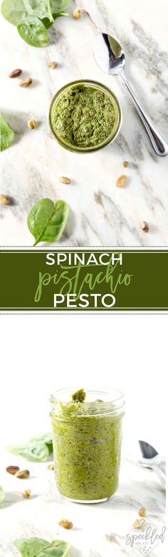 spinach pesto in a glass jar with spoons