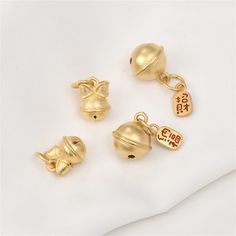 Gold Plated Bow Bell Charm Pendant, Jingle Bell Bracelet, Fortune Bell Necklace, Cat Bell Earring, Christmas Bell Jewelry, Festive Charm {Material}: copper, brass {Size}:  14# bell 13*14mm 13# bow bell 10*13mm ♥ Custom instructions: * If you have specific requests for this item, such as adding a logo, altering the size and color, please be aware that custom orders typically have a minimum quantity requirement and have a lead time of 2 weeks. If you're able to meet these requirements, please let Holiday Adjustable Gold Jewelry, Gold Jewelry For New Year Gift, Gold Jewelry For Festive Holiday Occasions, Adjustable Gold Holiday Jewelry, Gold Dangle Jewelry For Holiday, Gold Dangle Jewelry For Christmas, Festive New Year Dangle Jewelry, Gold Pendant Jewelry For Christmas, Gold Jewelry With Charms For Christmas