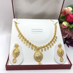 "Handmade Indian Bridal Wedding Jewelry 22ct Heavy Gold Plated Necklace Set with Earrings Indian Jewelry Indian Bollywood Jewelry , its Artificial Jewelry  Type :22ct Gold Plated Necklace Set Earrings Length: 2\"inches Approx Shape - As Shown in Picture It is a perfect match with formal attire on special occasions or with casual wearing Comes in Jewellery Gift Box Traditional Indian Wedding Jewellery Slight Colour variations possible due to difference in screen and photograph Care instructions K Gold Earrings For Marriage Diwali Festival, Wedding Jewelry Sets With Filigree, Wedding Filigree Jewelry Sets, Diwali Yellow Gold Round Jewelry Sets, Yellow Gold Bridal Necklace For Diwali, Diwali Bridal Round Yellow Gold Necklace, 22k Gold Round Temple Necklace For Wedding, Yellow 22k Gold Jewelry For Wedding, 22k Gold Round Hallmarked Jewelry Sets