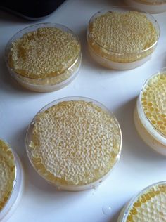 several round cakes sitting on top of a white counter