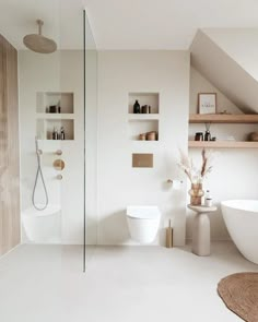 a bathroom with white walls and flooring next to a bathtub in the corner