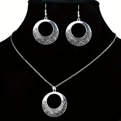 Attractive filigree round-shaped modern necklace and drop earrings set. To avoid tarnish, limit exposure to water, perfume, or body cream.

2-day processing. Shipped in 4-7 days. Earrings Necklace Set, Bearded Lady, Water Perfume, Modern Necklace, Satchel Backpack, Modern Necklaces, Accessories Jewelry Earrings, Silver Filigree, Women Accessories Jewelry