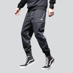 Take your fashion game to the next level with our 2023 Autumn Collection's street dark men's denim joggers! These monochrome. mid-waist joggers are perfect for making a statement. yet still keeping it comfortable and stylish. With their drawstring closure and stretchy fabric. they promise to keep you looking sharp even during the most intense streetwear looks.Why You'll Fall In Love Street Style: Make an impact with these joggers. designed to keep you looking your best no matter the season or oc