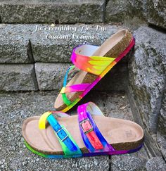 Be Soleful! Tie-Dye Birkenstock-style adjustable buckled slide sandals perfect for the hippie chick! Hand-colored and available in women's sizes 7-11. Be bright, be bold, and be colorful in these super comfy and cute tie-dye slide sandals! **Please note these are NOT the Birkenstock brand - they are made from high quality shoe that are just as cute and comfy** Colorful Adjustable Open Toe Sandals, Adjustable Multicolor Slide Sandals, Adjustable Multicolor Slides For Beach, Adjustable Multicolor Open Toe Flip Flops, Adjustable Open Toe Multicolor Slides, Adjustable Multicolor Open Toe Slides, Multicolor Adjustable Open Toe Slides, Adjustable Multicolor Bohemian Flip Flops, Summer Hippie Tie-dye Bottoms