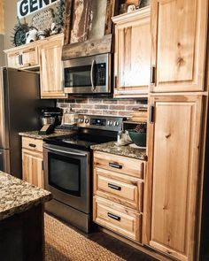 a kitchen with wooden cabinets and granite counter tops