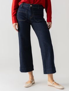 DETAILS Standard Rise Cropped Denim Trouser Wide Leg 2 Front Patch, 2 Back Pockets Button Front and Zip Fly Closure SIZE + FIT Model is 5'9 and is wearing a size 27. If in-between sizes, size down. Waist: 29" Front Rise: 10 1/2" Inseam: 27" Leg Opening: 20" FABRIC + CARE 99% Cotton 1% Spandex Comfort Stretch Denim Machine Wash Cold, Tumble Dry Low. Imported BETTER COTTON MEMBERS By choosing our cotton products, you support our investment in Better Cotton's mission. This product is sourced via a mass balance system and therefore may not contain Better Cotton. To learn more, go to bettercotton.org/massbalance. Dark Wash Mid-rise Rigid Denim Bottoms, Mid-rise Dark Wash Rigid Denim Bottoms, Spring Flare Jeans With Patch Pockets In Dark Wash, Spring Dark Wash Flare Jeans With Patch Pockets, Classic Denim Blue Pants With Patch Pockets, Denim Blue Flare Jeans With Patch Pockets For Work, Denim Blue Wide Leg Jeans With Welt Pockets, Wide Leg Jeans With Welt Pockets In Denim Blue, Wide Leg Denim Blue Jeans With Welt Pockets