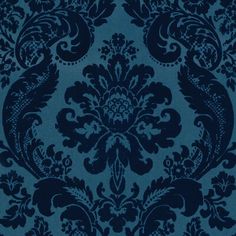 a blue and black wallpaper with an ornate design on it's side,