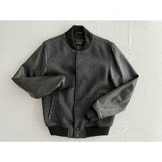 "Wool and leather bomber style jacket by Danier.   Grey wool with a black leather sleeves for a sleek tonal look. Excellent layering piece, great staple that you will have forever. Marked size small-may be mens small since it fits more like a women's medium Chest 39\" Waist 29\" Sleeve 26\" Shoulders 17.5\" Length 24.5\" 60% wool 40% polyester  genuine leather  lining 50% cotton 50% polyester Condition is excellent; shows no signs of wear" Classic Black Wool Varsity Jacket, Leather Jacket With Ribbed Cuffs For Streetwear, Black Wool Varsity Jacket For Streetwear, Black Wool Outerwear With Baseball Collar, Fitted Black Leather Jacket With Ribbed Cuffs, Black Fitted Leather Jacket With Ribbed Cuffs, Black Wool Varsity Jacket With Long Sleeves, Leather Varsity Jacket For Winter Workwear, Tailored Wool Varsity Jacket For Fall