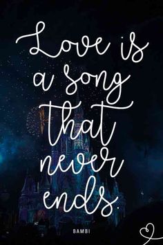 the words love is a song that never ends in front of a castle at night