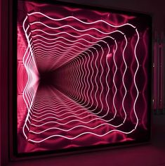 an abstract art piece with pink lights in the center and wavy lines on the wall