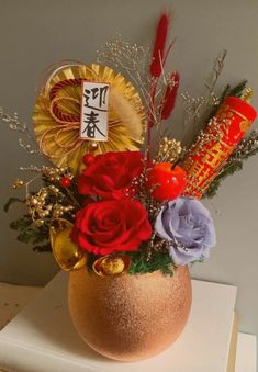 a vase filled with flowers on top of a table