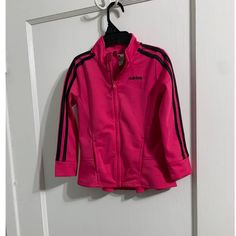 great used condition. Adorable Adidas active wear jacket 3-stripe design ruffled. Pink with black accents. Pink Long Sleeve Sports Outerwear, Pink Sports Track Jacket With Long Sleeves, Pink Hooded Track Jacket For Sports, Pink Sporty Long Sleeve Outerwear, Pink Long Sleeve Outerwear With Zipper Closure, Pink Long Sleeve Outerwear With Zipper, Pink Adidas Sports Outerwear, Pink Adidas Track Jacket For Spring, Adidas Pink Track Jacket For Spring