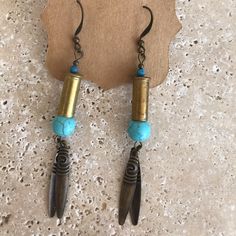 Hand-Crafted .22 Caliber Drop Earrings. Brass And Turquoise. Lightweight 3” Length And One-Of-Kind Design. Shell Casings Crafts, 22 Caliber, Bullet Earrings, Antler Art, Bullet Jewelry, Diy Jewlery, Crafts Jewelry, Steampunk Jewelry, Diy Crafts Jewelry