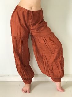 "Cotton Soft Rope Pants, Lady Pants, Light Weight Women Pants If you are looking for some pants that you can wear everywhere, comfortable, relax and Easy to wear. Cotton Soft Pants is Answer!! Nice gift for yourself or your lover Approx. Measurements: Waist 40\" Length 37\" Hip 48\" Inseam 28\" Ankle 12\" FRONT RISE: Measure from the center of the crotch to the top of the waist = 11\" - Condition: Brand new without tags. 100% Cotton - Made in Thailand Shipping & Handling * Parcels will be sh Peekaloons Pants, Comfortable Solid Color Ankle-length Harem Pants, Comfortable Full-length Harem Pants With Pockets, Bohemian Style Solid Bottoms With Pockets, Brown Harem Pants With Elastic Waistband, Bohemian Bottoms With Pockets In Solid Color, Brown Harem Pants With Loose Fit, Baggy Bohemian Solid Bottoms, Baggy Bohemian Bottoms In Solid Color