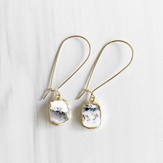 Where the timeless elegance meets modern vibes, that's where you'll find these drop earrings. GEMSTONE: Available in Azurite Jasper, Clear, Dendrite Opal, Rutilated Quartz CLOSURE: Gold plated kidney ear wires LENGTH: 2" long Everyday White Gemstone Earrings, Minimalist Natural Stone Earrings, Minimalist Natural Stone Teardrop Earrings, White Dangle Earrings With Ethical Gemstones, Dendrite Opal, Earrings Gemstone, Gem Jewelry, Crystal Dangle Earrings, Earrings In Gold