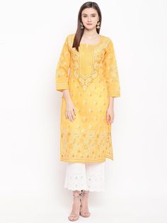 Yellow Straight Kurta With Intricate Embroidery, Festive Straight Kurta Tunic With Chikankari Embroidery, Festive Tunic With Chikankari Embroidery In Straight Kurta Style, Chikankari Embroidered Tunic Kurta For Navratri, Yellow Chikankari Embroidered Straight Kurta, Festive Straight Tunic With Chikankari Embroidery, Navratri Chikankari Embroidery Tunic Kurta, Navratri Kurta With Chikankari Embroidery, Chikankari Embroidered Tunic For Navratri