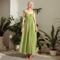 Model is 5ft8 (1.74cm) and wearing size S - Color: Baby Green Name: Linen smocked dress, linen maxi dress, linen long dress, linen women dress, linen regency dress, linen smocking pull over style with squared neck lower back linen dress, linen ruffle straps dress, linen gathered bust dress, linen babydoll dress, linen shift dress, linen full dress, linen ankle length dress, linen skater dress, linen fit and flare dress Lining: No Pocket: Yes Button Detail  * All Linen Products: 100% Coconut Shel Green Ruffled Sundress Maxi Dress, Sleeveless Smocked Maxi Dress For Garden Party, Sleeveless Smock Maxi Dress For Garden Party, Green Sundress With Smocked Bodice, Green Sundress Maxi Dress With Ruffle Hem, Bohemian Green Sundress With Smocked Bodice, Green Sundress With Ruffled Straps, Green Cottagecore Dress With Ruffles, Green Midi Length Smocked Sundress