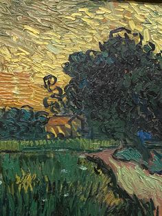 an oil painting of a tree near a body of water with yellow sky in the background