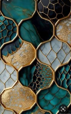 an abstract design made with gold and blue marbles on a black background that is also in the form of hexagon tiles