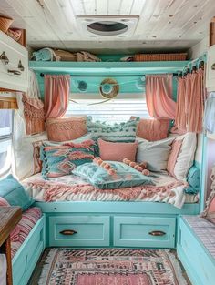 the interior of a camper is decorated in pastel colors