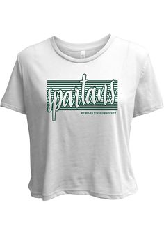 Let everyone know who you root for in this Michigan State Spartans White Blair Flowy Cropped Short Sleeve T-Shirt! This MSU Short Sleeve Tee features a center front screen print school and mascot name. Dual blend fabrication, Short sleeve, Cropped length, Flowy fit, Ribbed collar, 65% Polyester - 35% Viscose, Imported High School T-shirts, High School Athletics Shirt, High School Cheer Shirts Design, T Shirt Design School, Cheer Spirit Shirts, One Color Shirt Design, Athletic T Shirt Design, School Shirt Designs Spirit Wear Trendy, College T Shirts Design