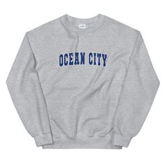 These Sweatshirts Fit True To Size We suggest a size up for a looser fit. Visit www.locoolapparel.com for more products! A sturdy and warm sweatshirt bound to keep you warm in the colder months. The Ocean City Maryland Vintage Style Varsity Letter Crewneck Sweatshirt is a pre-shrunk, classic fit sweater that's made with air-jet spun yarn for a soft feel and reduced pilling. * 50% cotton, 50% polyester * Pre-shrunk * Classic fit with no center crease * 1x1 athletic rib knit collar with spandex * Fitted Sweater, Minneapolis, Baltimore, Cincinnati, Alabama, Black And Navy, Style Vintage, Tank Top Shirt, Unisex Sweatshirt