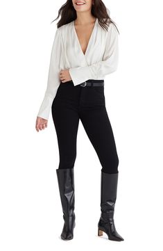 A glossy bodysuit boasts a deeply dipped neckline and artfully tailored cuffs for a sleek add-in to your date-night look. Surplice V-neck with hidden-snap closure Long sleeves with two-button cuffs Partially lined 100% polyester with 94% polyester, 6% spandex contrast Dry clean or hand wash, dry flat Imported Women's Clothing Satin Bodysuit, Bodysuit Blouse, Satin Long Sleeve, Favorite Daughter, Night Looks, Black Bodysuit, Long Sleeve Bodysuit, Black Blouse, Pullover Styling