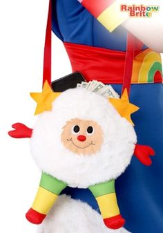 a stuffed animal hanging from the back of a bag