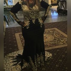 Gold And Black Gown With Embroidered Train In Excellent Condition Gown Is Sleeveless. Appliqud Catsuit Included To Create Sleeves. Gold And Black Gown, Sleeveless Gown, Black Gown, Catsuit, Black And Gold, Red Gold, To Create, Womens Sizes, Train