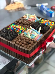 a chocolate cake decorated with candy and candies