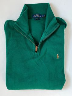 New with tags estate rib 100% cotton in green. It is a deep Kelly green Polo pony Embroidered patch Size XL Thank you Green Cotton Polo Sweater For Fall, Green Half-zip Sweatshirt For Fall, Casual Green Polo Sweater With Ribbed Collar, Green Casual Polo Sweater With Ribbed Collar, Green Cotton Polo Sweater For Winter, Winter Green Half-zip Top, Winter Half-zip Green Tops, Green Half-zip Winter Top, Green Half-zip Fall Sweater