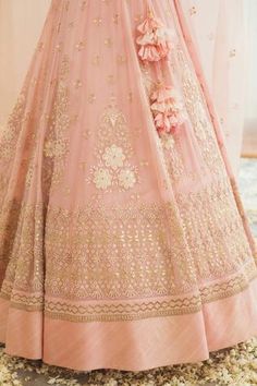 Crystal rose lehenga with chikankari embroidery and gota patti work. Comes with blouse and dupatta.
Component: 3
Embroidery
Neckline: Scoop
Sleeve Length: Three Quarter
Fabric: Silk; Lining: Shantoon
Color: Pink
Embellished dupatta with cutwork and tassels
Closure: Side zip with tie up and tassels
Note: Hair accessory worn by the model is not for sale - Aza Fashions Eid Pink Choli With Chikankari Embroidery, Pink Anarkali Choli With Chikankari Embroidery, Pink Choli With Chikankari Embroidery, Pink Chikankari Embroidery Lehenga, Festive Pink Choli With Chikankari Embroidery, Festive Pink Chikankari Choli, Pink Lehenga With Chikankari Embroidery For Reception, Pink Choli With Chikankari Embroidery For Navratri, Pink Chikankari Embroidered Choli For Navratri