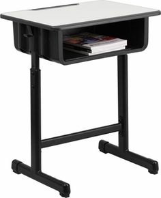 a black and white computer desk with magazine rack on it's side, against a white background