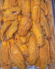 fried chicken wings in a basket ready to be eaten