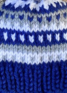 Are you a Colts fan? This beanie is for you! Indianapolis Colts NFL team colors beanie will keep you warm in the stands on game day! Show your team spirt all winter long, running errands about town with this fair isle beanie that features the colors of your favorite NFL team! The classic fair isle pattern can be made in multiple sizes so they whole family head to the stadium in coordinating/matching beanies! Acrylic yarn Color: Bright blue, with white and silver contrasting colors. Choose your l Fair Isle Beanie, Nfl Team Colors, Pom Pom Fashion, Yarn Pom Pom, Fair Isle Pattern, Indianapolis Colts, Nfl Teams, Yarn Colors, Team Colors