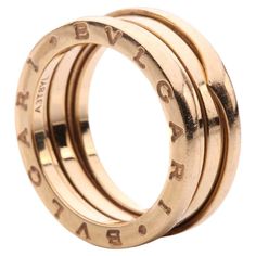 Beautiful Pre-owned Bulgari B-Zero ring, rose gold, and ode to Italian architecture, taking inspiration from the famous Colosseum. A Classic and elegant ring suitable for daily wear. The purity of its distinctive spiral design, is a metaphor for the harmony of past, present and future. This is reflected in the magnificence of the eternal city - and the emblem of the pioneering spirit of the collection. Bulgari - B.zero1 ring rose gold, signed and numbered, Italian assay marks 'Au 750', size O, t Designer 14k Rose Gold Rings, Designer Rose Gold 14k Rings, Designer Rose Gold Rings For Anniversary, Designer Rose Gold Rings For Formal Occasions, Luxury Hallmarked Rose Gold Engraved Ring, Luxury 14k Rose Gold Engraved Ring, Modern Hallmarked Rose Gold Rings, Italian Architecture, Contemporary Ring