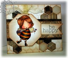 a handmade card with a bee holding a flower and the words be happy on it