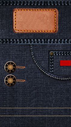 the back pocket of a pair of blue jeans with buttons and a leather tag on it