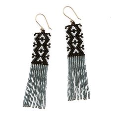 These beaded fringe earrings have a bold patterned top that flows to swingy fringe. Great day into night style! Glass beads with a gold-plated ear wire. 3.25" long. Made by artisans in Guatemala Elegant Beaded Earrings With Fringe For Festivals, Elegant Beaded Fringe Earrings For Festivals, Artisan Fringe Dangle Earrings, Artisan Dangle Tassel Earrings With Fringe, Artisan Fringe Dangle Jewelry, Artisan Fringe Drop Earrings, Artisan Fringe Tassel Dangle Earrings, Artisan Tassel Dangle Earrings With Fringe, Artisan Dangle Fringe Jewelry