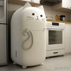 a white cat shaped refrigerator in a kitchen